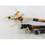 A GROUP OF 4 WALKING STICKS, ONE HAVING MOUSE TOP, HORN HANDLES AND OTHER HEAD ETC.