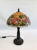 A DECORATIVE TIFFANY STYLE TABLE LAMP - SOLD AS SEEN.