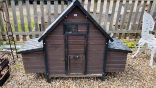 A "COCOON" CHICKEN COOP.