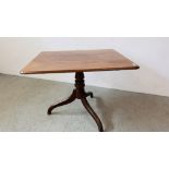 AN OAK TILT TOP PEDESTAL TABLE WITH RECTANGULAR TOP 83 X 102CM ON TRIPOD BASE.