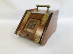 A VINTAGE HARDWOOD COAL SCUTTLE, THE BRASS DETAIL EMBOSSED WITH EGYPTIAN HEADS.