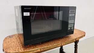 A SHARP MICROWAVE OVEN - SOLD AS SEEN.