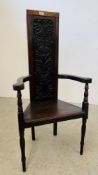A CRAVED OAK CHAIR IN C17th STYLE.