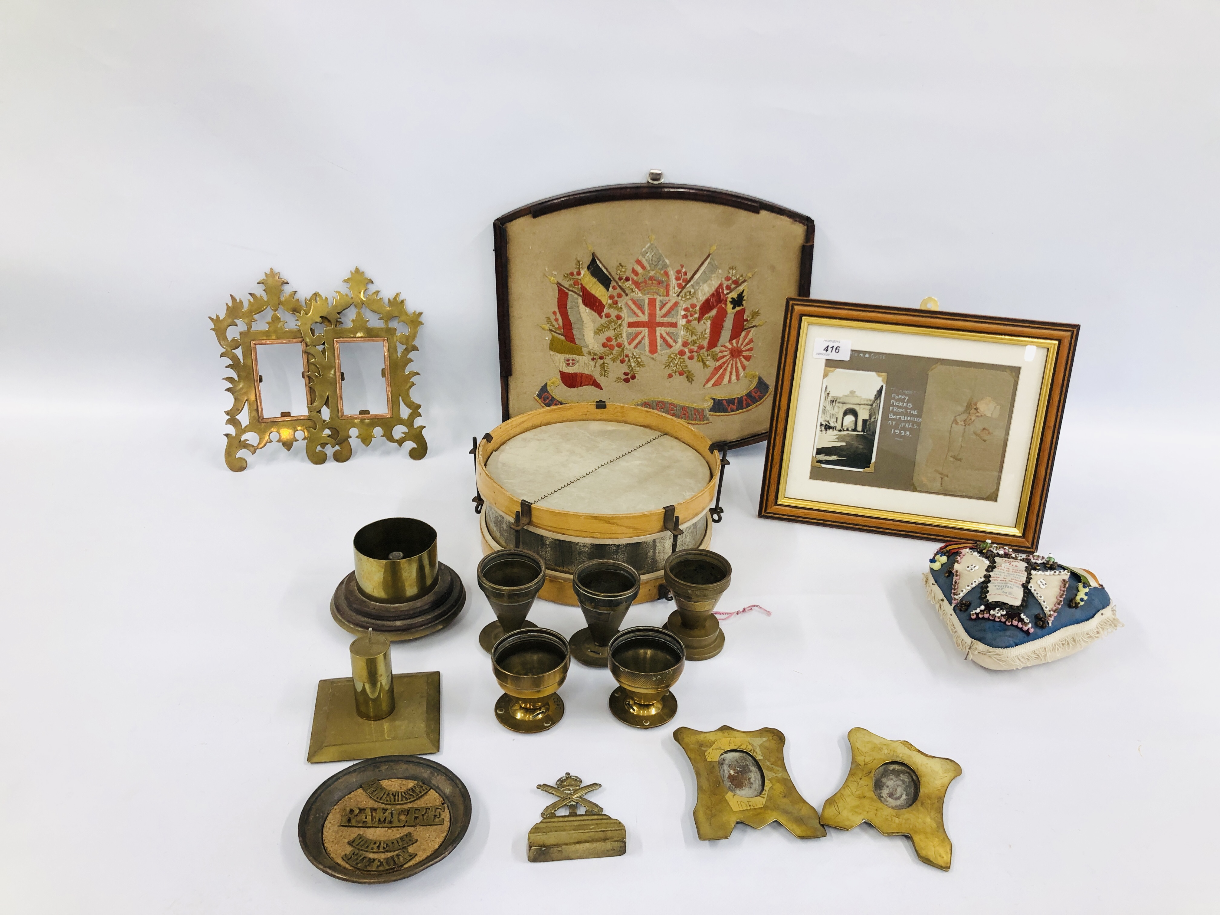 A BOX OF COLLECTIBLES TO INCLUDE TRENCH ART, FRAMES, PIN CUSHION, GREAT EUROPEAN TAPESTRY, DRUM,