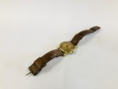 A VINTAGE GENT'S WRIST WATCH MARKED DREFFA ON BROWN LEATHER STRAP.