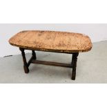 AN ARTS AND CRAFTS STYLE OAK BASED OCCASIONAL TABLE WITH HAMMERED COPPER TOP AND STUD DETAIL.