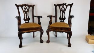 TWO REPRODUCTION CARVED MAHOGANY FINISH CHILDREN'S ARMCHAIRS IN THE CHIPPENDALE STYLE H 644CM & H