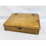AN ANTIQUE WAXED PINE WRITING SLOPE WITH FITTED INTERIOR. W 77CM. D 68CM. H 31CM.