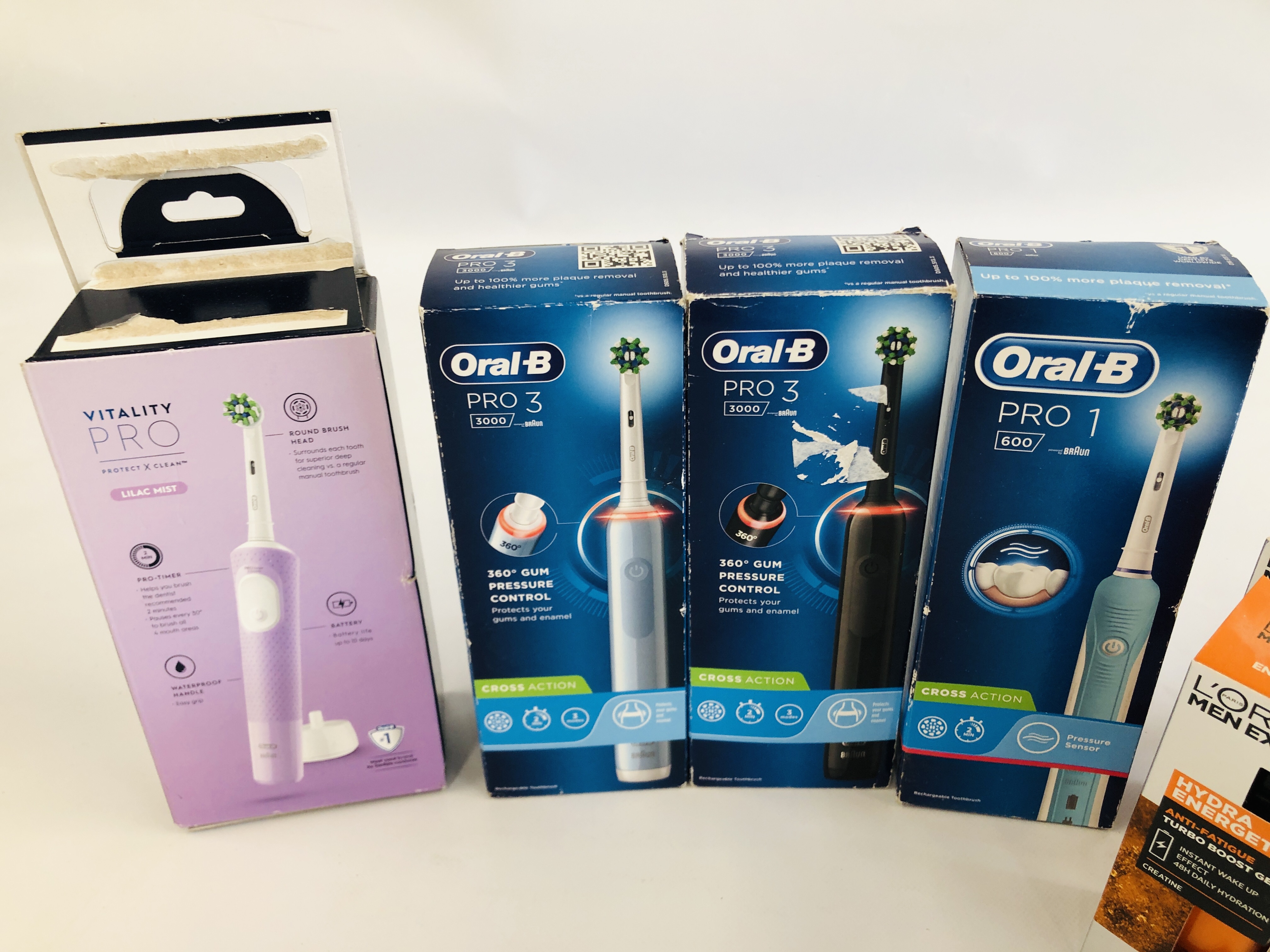 4 AS NEW BOXED ORAL B ELECTRIC TOOTHBRUSHES + BODY CARE PRODUCTS. - Image 4 of 4