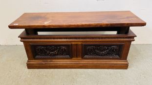 A HARDWOOD RECTANGULAR SIDE TABLE WITH RISE AND FALL TOP, CARVED PANEL DETAIL. W 124CM. D 38CM.