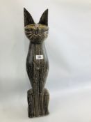 A STANDING HARDWOOD MODEL OF A CAT, 63CM HIGH.