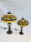 TWO REPRODUCTION TIFFANY STYLE TABLE LAMPS WITH LEADED GLASS SHADES - THE TALLEST 60CM.