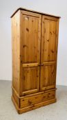 A HONEY PINE 2 DOOR SINGLE DRAWER WARDROBE. W 85CM. D 53CM. H 174CM.