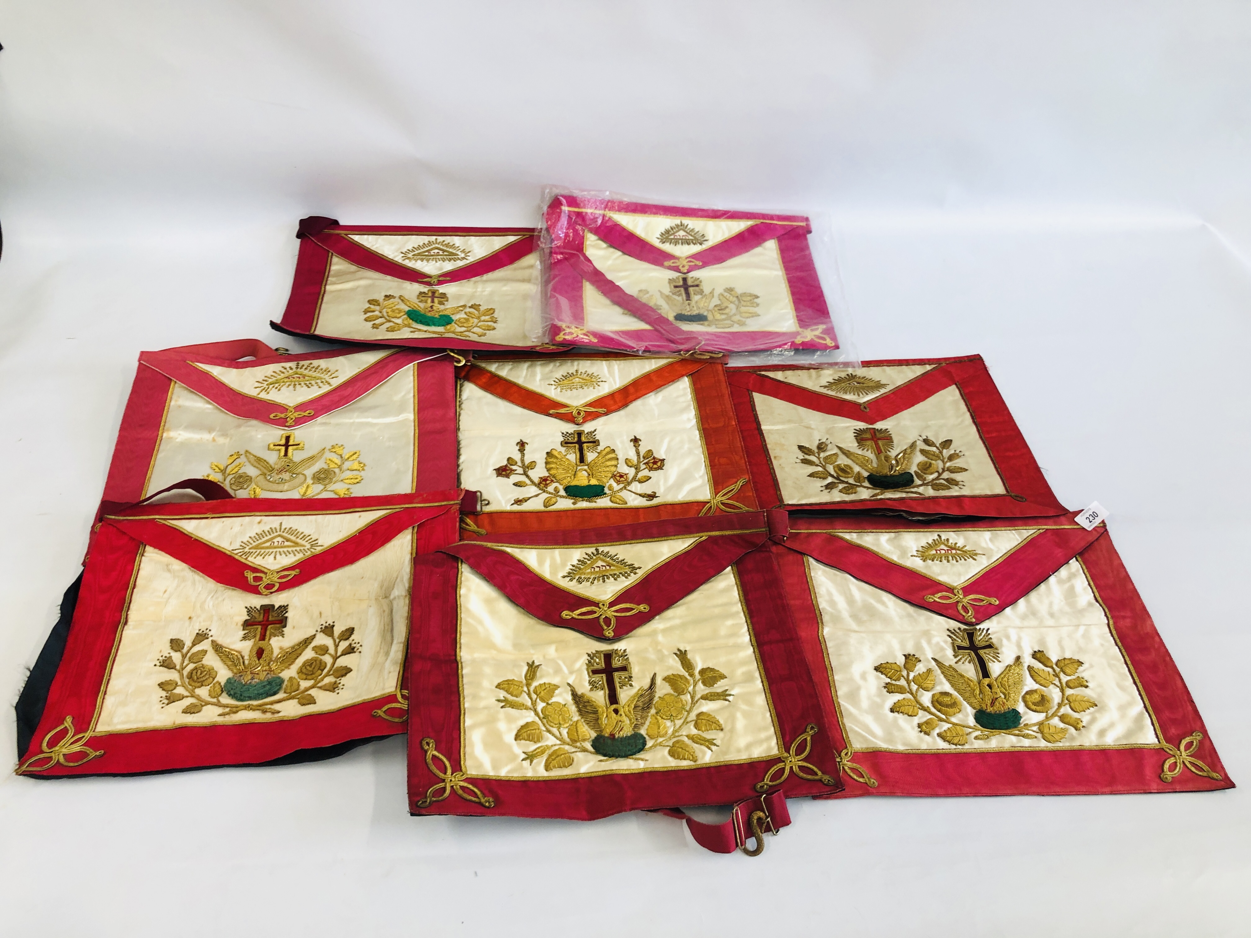 A GROUP OF 8 ELABORATE VINTAGE MASONIC APRONS.