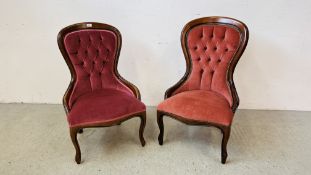 TWO REPRODUCTION BUTTON BACK VICTORIAN STYLE NURSING CHAIRS UPHOLSTERED IN PINK VELOUR.