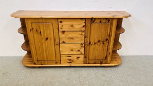HONEY PINE DRESSER BASE, FOUR CENTRAL DRAWERS FLANKED BY CUPBOARDS AND OPEN SHELVES. W 160CM.
