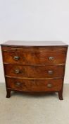AN ANTIQUE MAHOGANY FINISH BOW FRONT THREE DRAWER WITH PULL OUT SECTIONS AND DECORATIVE BRASS