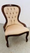 REPRODUCTION BUTTON BACK FAWN VELOUR UPHOLSTERED NURSING CHAIR. H 89CM.