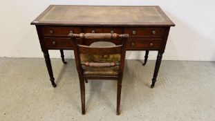 AN ANTIQUE MAHOGANY FIVE DRAWER WRITING DESK WITH TOOLED LEATHER TOP AND SIMILAR CHAIR WITH REEDED