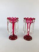 A PAIR OF VINTAGE CRANBERRY GLASS LUSTRES WITH CLEAR GLASS DROPS - H 27.5CM.