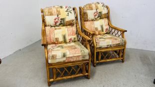A PAIR OF CANE FRAMED CONSERVATORY CHAIRS.