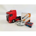 A REMOTE CONTROLLED SCANIA HIGHLINE LORRY COMPLETE WITH CHARGER AND REMOTE - SOLD AS SEEN.