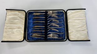 A CASED SET OF SIX SILVER FISH KNIVES AND FORKS BY RODGERS & SONS SHEFFIELD 1932