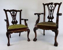 TWO REPRODUCTION CARVED MAHOGANY FINISH CHILDREN'S ARMCHAIRS IN THE CHIPPENDALE STYLE H 64CM & H