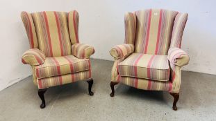 TWO GOOD QUALITY WING BACK EASY CHAIRS UPHOLSTERED IN GLENFINNAN CARDINAL MATERIAL.