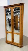 A G PLAN HONEY PINE CORNER UNIT WITH SHELVED INTERIOR AND MIRRORED PANEL DOORS W 107CM H 192CM.