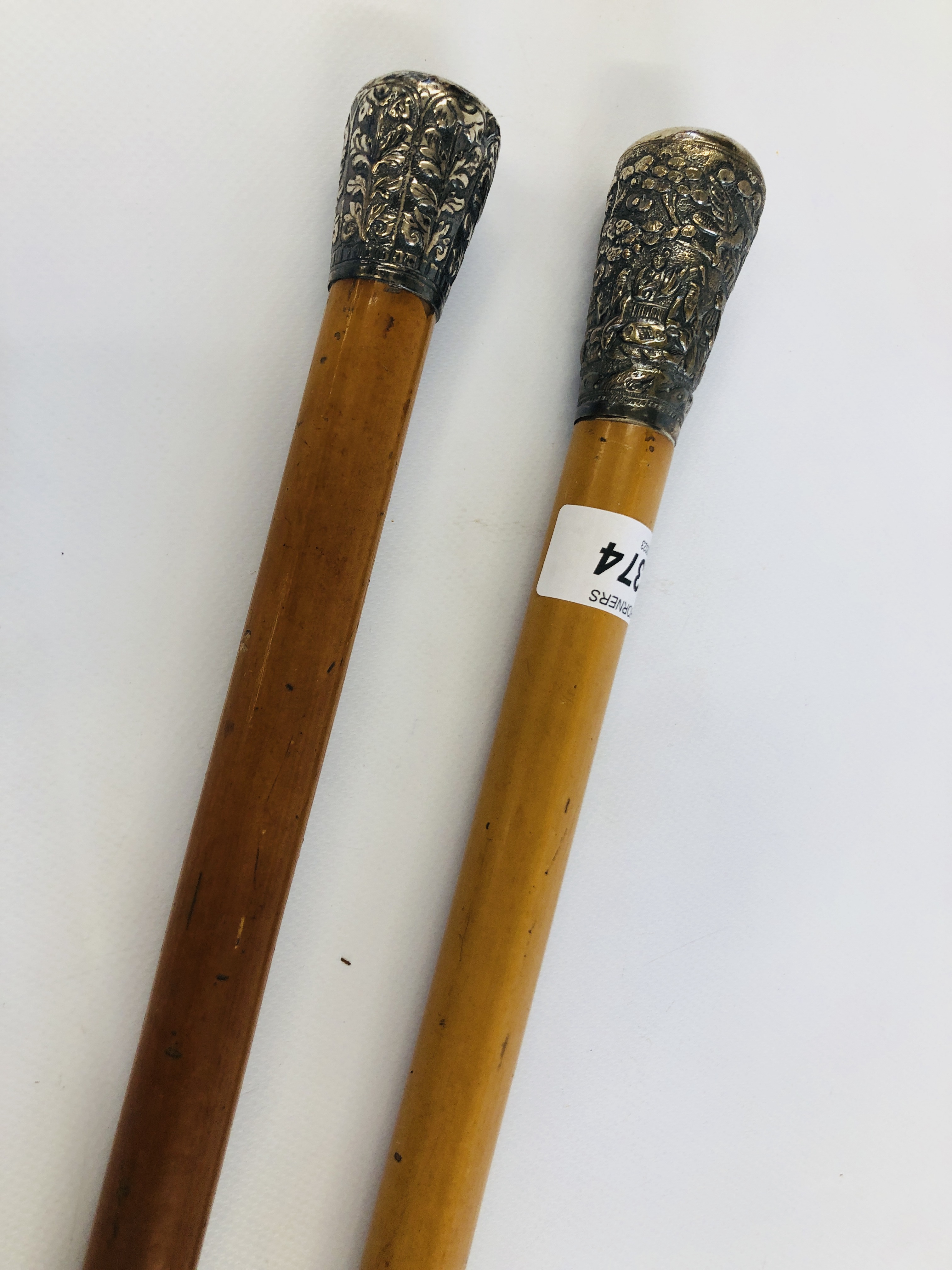 TWO VINTAGE WHITE METAL TOPPED WALKING CANES TO INCLUDE ONE ORIENTAL EXAMPLE. - Image 7 of 9