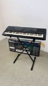 YAMAHA PSR-400 ELECTRIC KEYBOARD IN ORIGINAL BOX ALONG WITH A CROCODILE SYSTEM STAND - SOLD AS SEEN.