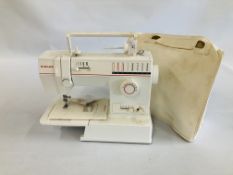 SINGER SEWING MACHINE WITH INSTRUCTIONS AND COVER (NO FOOT PEDAL). - SOLD AS SEEN.