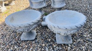 A PAIR OF LARGE CLASSICAL BOWL SHAPED PEDESTAL STONEWORK PLANTERS WITH RELIEF SHELL AND FOLIAGE