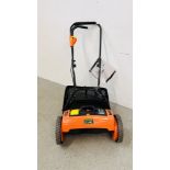 A VICTOR GARDEN TOOLS 24 VOLT RECHARGEABLE CYLINDER MOWER COMPLETE WITH CHARGER AND MANUAL.