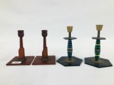 TWO PAIRS OF DECORATIVE ART DECO PLASTIC CANDLESTICKS.