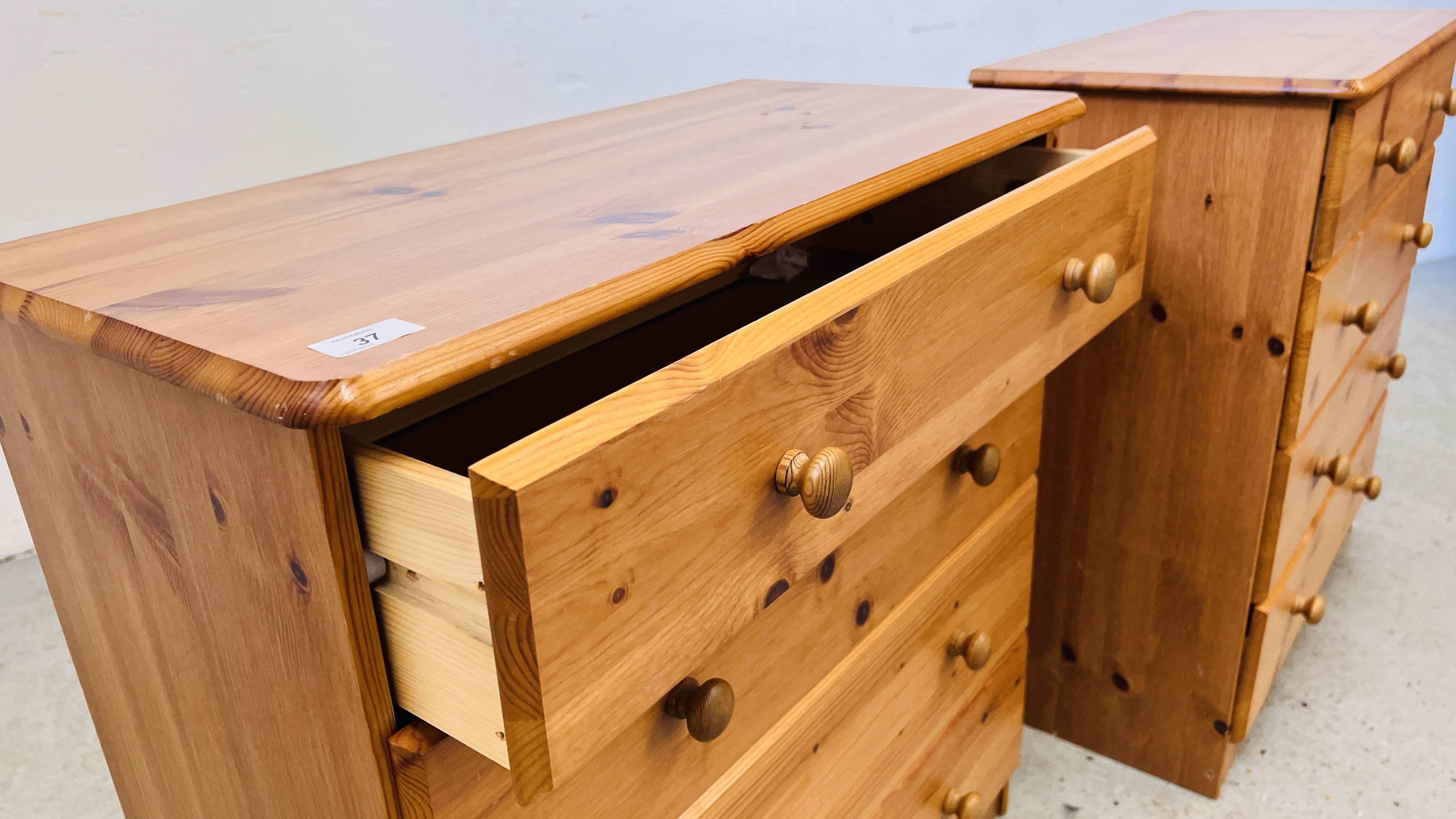 A PAIR OF MODERN HONEY PINE FOUR DRAWER CHESTS - EACH W 71CM D 34CM H 73CM. - Image 8 of 8