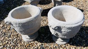 A PAIR OF STONEWORK PEDESTAL TUB PLANTERS WITH SCROLLED HANDLES AND FOLLIATE DESIGN, HEIGHT 46CM,