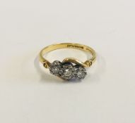 AN 18CT & PLAT 3 STONE DIAMOND CROSS OVER RING MARKED "BRAVINGTONS"