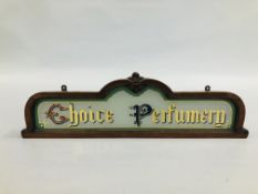 AN ANTIQUE GLASS ADVERTISING SIGN ENCASED IN A MAHOGANY FRAME "CHOICE PERFUMERY" M.