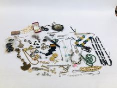 A LARGE TRAY OF COSTUME JEWELLERY AND SHOE TRIMS.