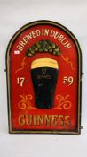 A REPRODUCTION ARCHED TOP "GUINNESS" ADVERTISING SIGN, W 60CM X H 90CM.