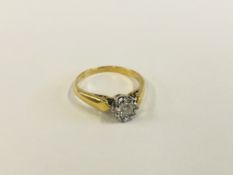 AN 18CT GOLD DIAMOND SOLITAIRE RING.