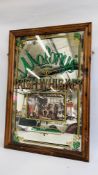 A LARGE FRAMED ADVERTISING MIRROR "MALONYS" IRISH WHISKY, W 65CM X H 96CM.