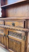 AN OLD CHARM OAK DRESSER, TWO DOOR, TWO DRAWER CUPBOARD BASE.