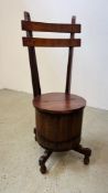 AN OAK BARREL SEATED CHAIR WITH LIFT TOP AND HIGH BACK.