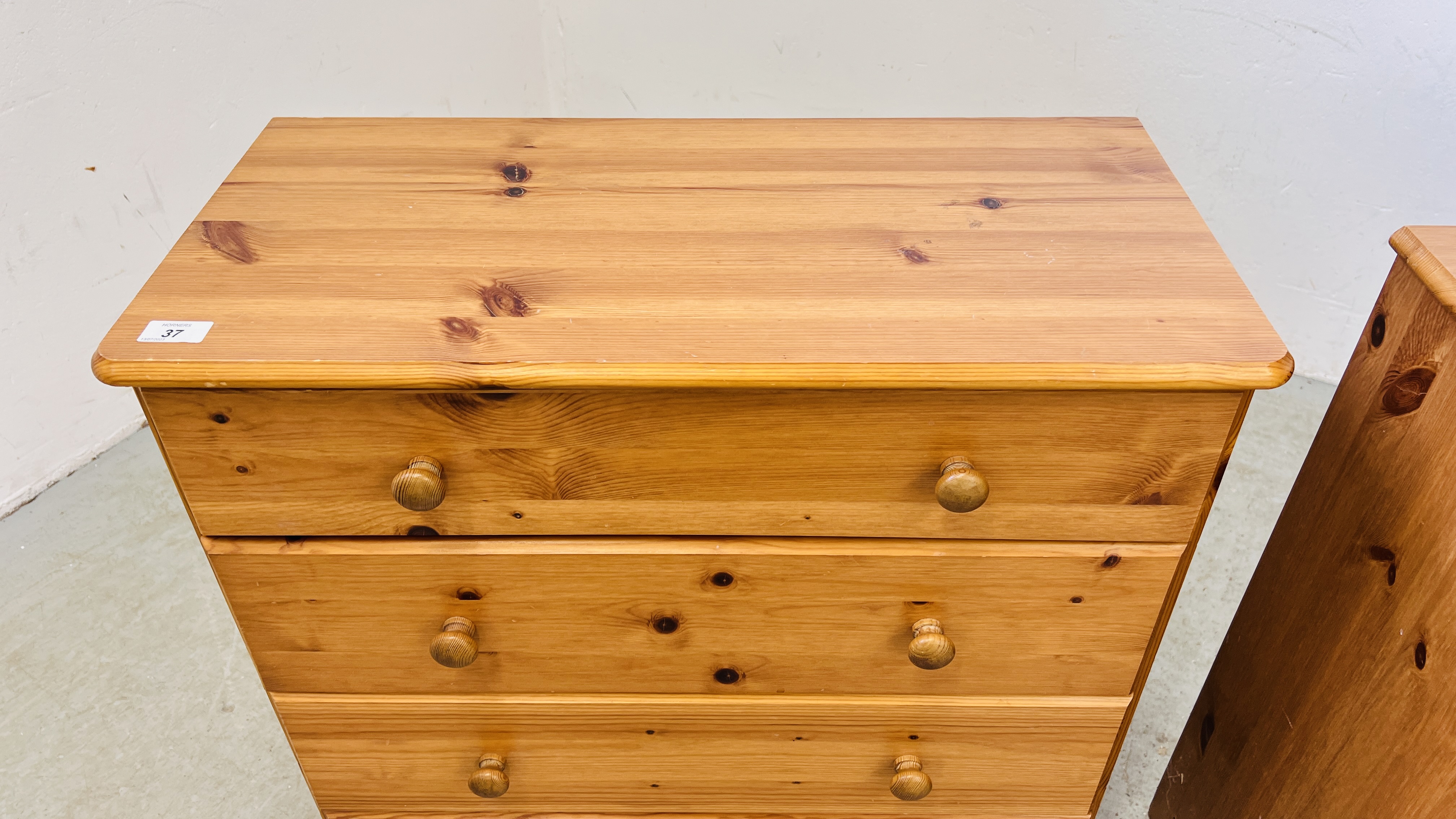 A PAIR OF MODERN HONEY PINE FOUR DRAWER CHESTS - EACH W 71CM D 34CM H 73CM. - Image 5 of 8