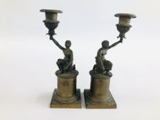 A PAIR OF FIGURAL VICTORIAN BRASS CANDLE STICKS 26CM H.