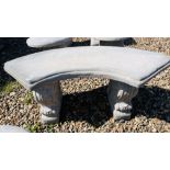 A CLASSICAL DESIGN STONEWORK GARDEN SEAT, THE CURVED TOP ABOVE SCROLLED SUPPORTS, LENGTH 100CM.