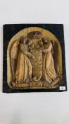 AN ANTIQUE HARDWOOD CARVED RELIGIOUS PLAQUE BEARING AN INSCRIPTION. W 41.5CM X H 45CM.